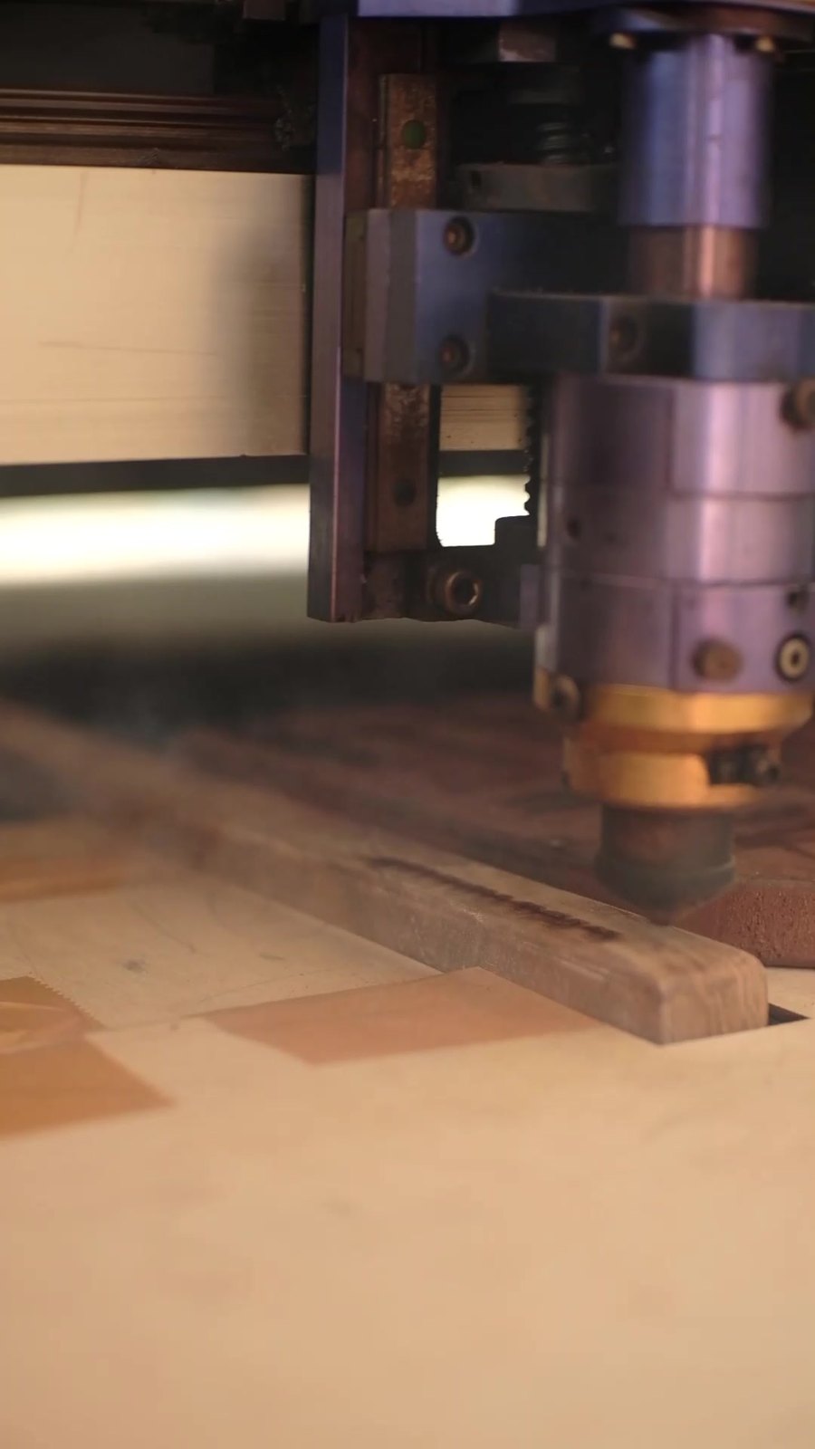 Javanti Kayu mark being engraved into a teak plate
