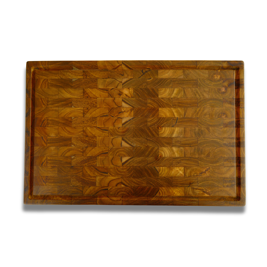 End-grain teak cutting board with juice groove, checkerboard grain, top view