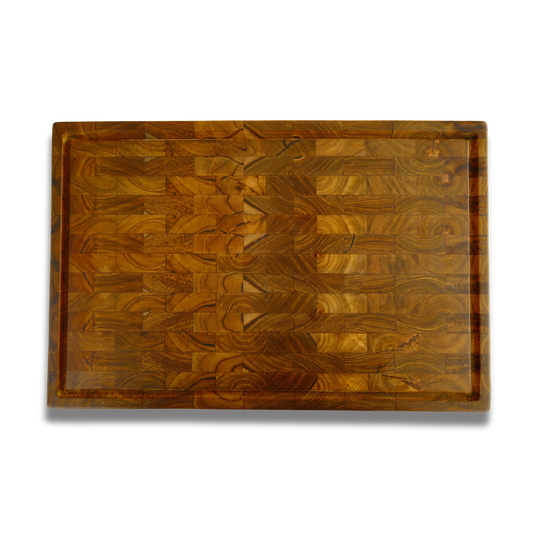 End-grain teak cutting board with juice groove, checkerboard grain, top view