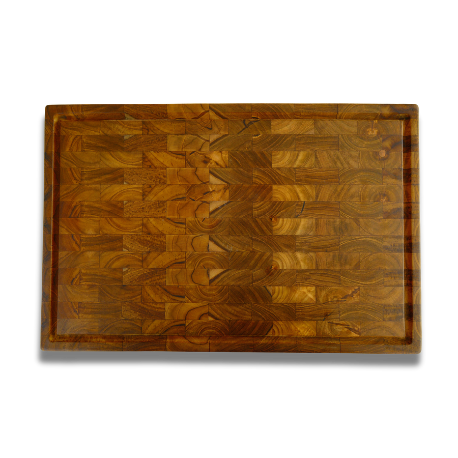 End-grain teak cutting board with juice groove, checkerboard grain, top view