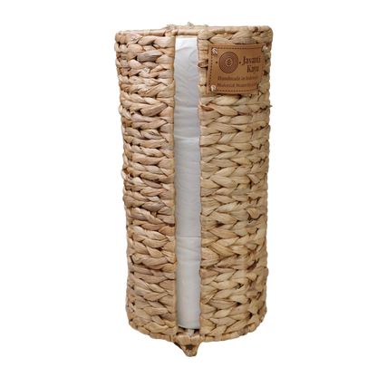 Water hyacinth basket storing a spare toilet paper roll, Javanti Kayu label