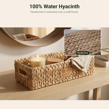Long water hyacinth basket on a console table with a candle, close-up of the weave
