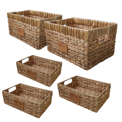 Set of 5 handwoven water hyacinth baskets, three small and two medium, with Javanti Kayu labels