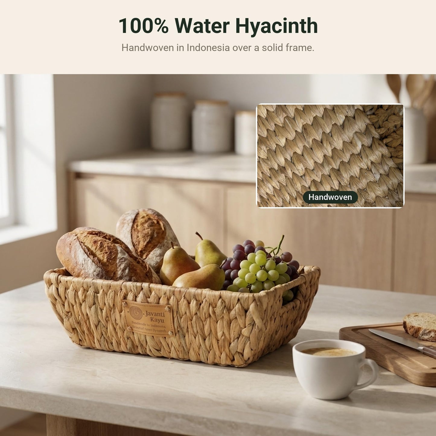 Woven water hyacinth tray on a kitchen counter filled with bread and fruit