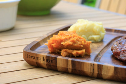 Javanti Kayu laser engraving on the end grain teak steak plate beside sides in the divided zone